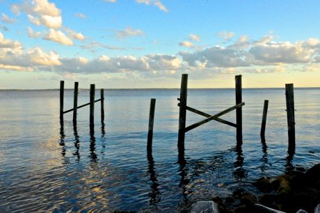old pier waterfront clouds